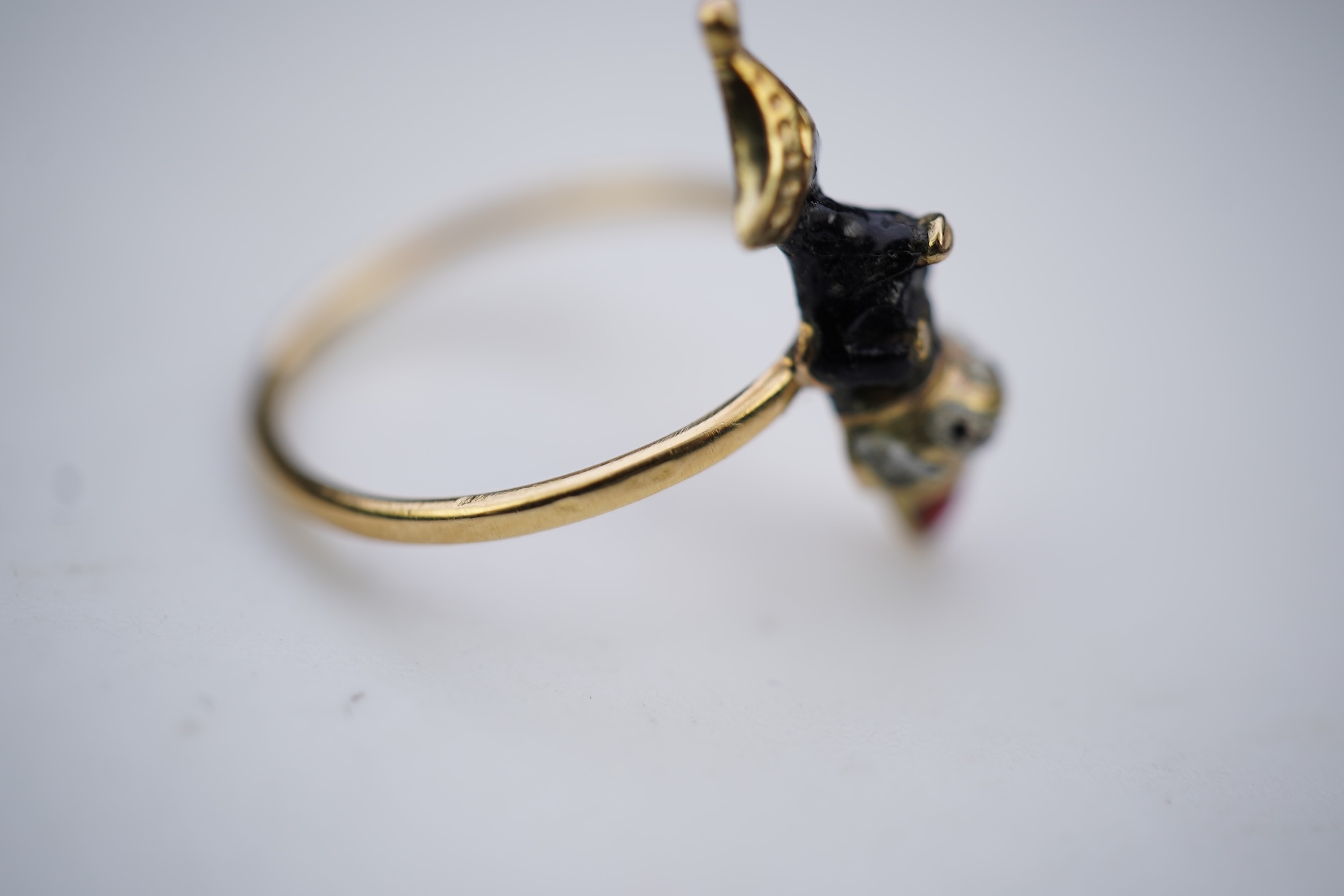 An enamel ring and a hardstone swivel fob seal